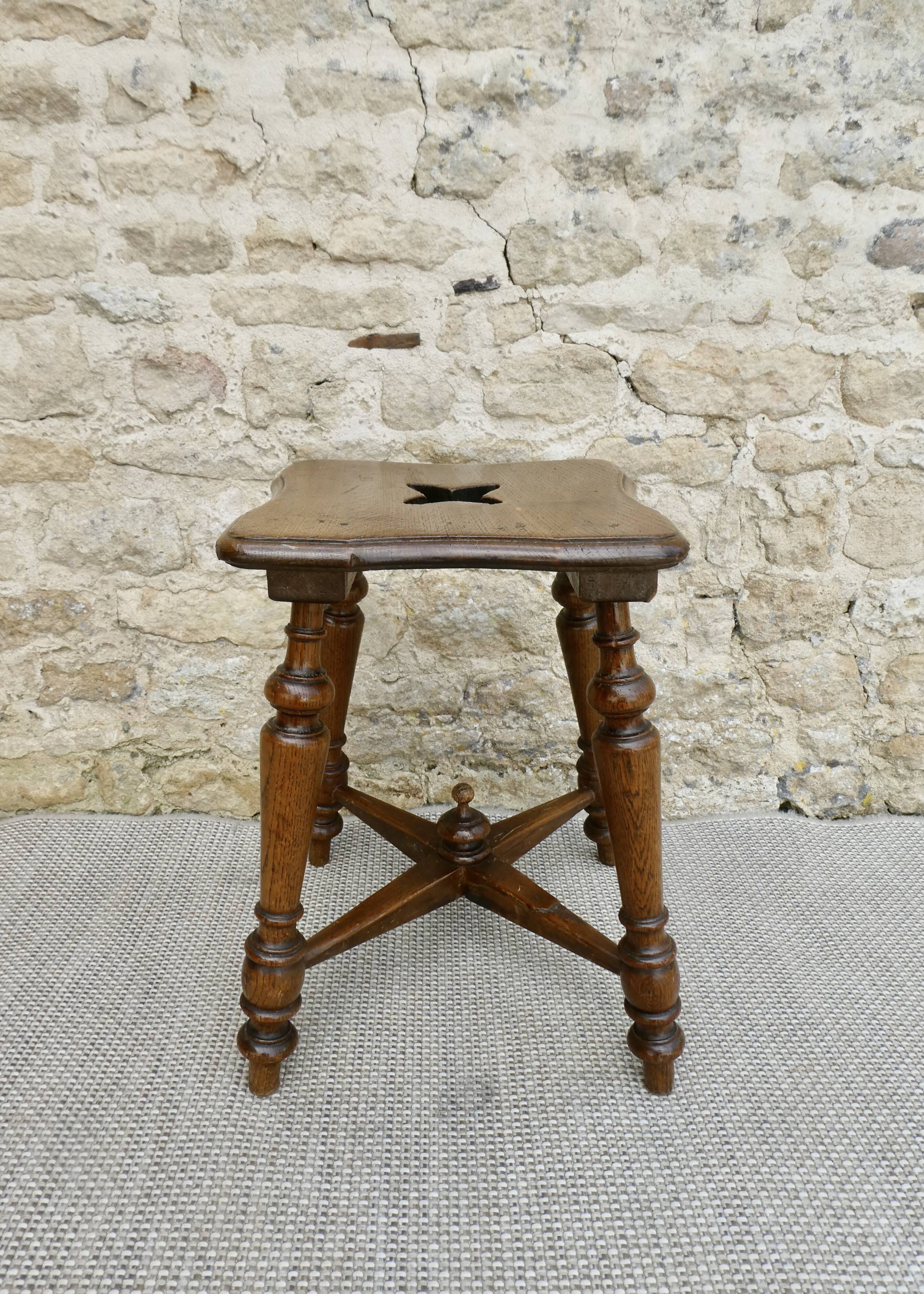 Solid wood and carved stool