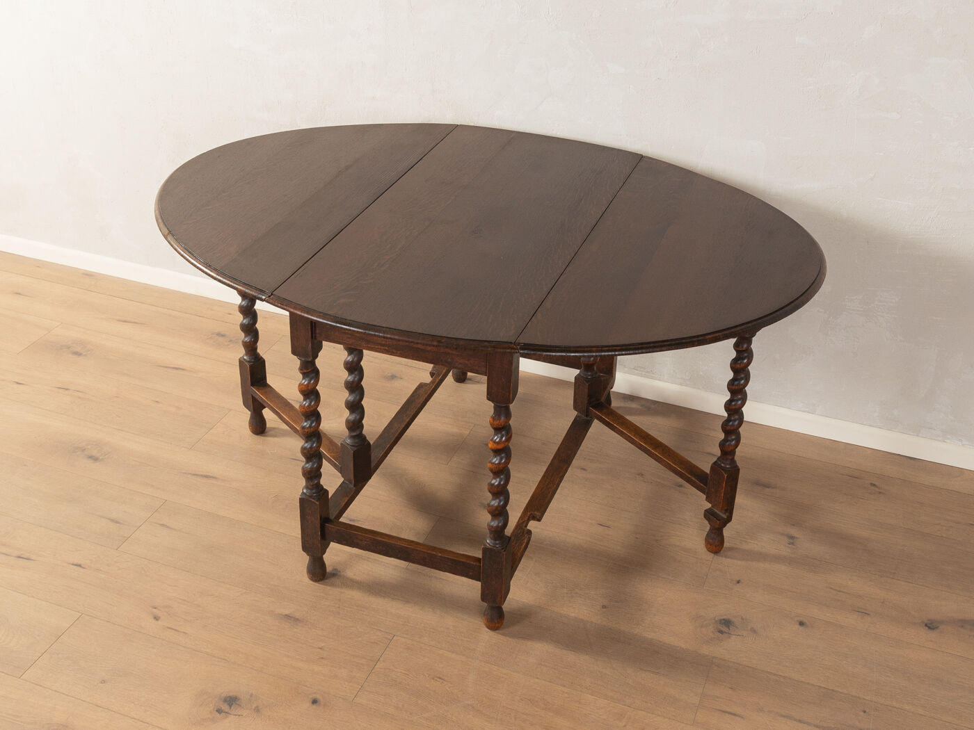Antique gateleg table from the 1920s, solid oak