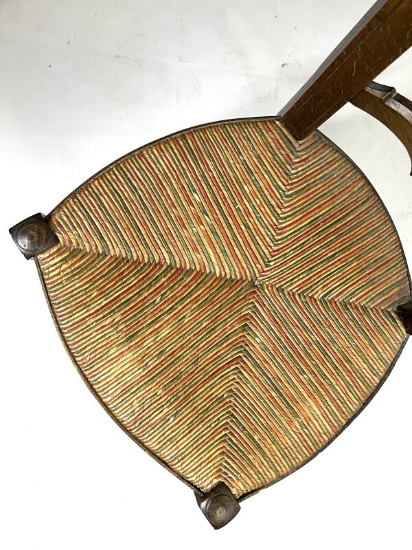 Chaise de nourrice ancienne en bois et paille – dossier ajouré à barreaux c