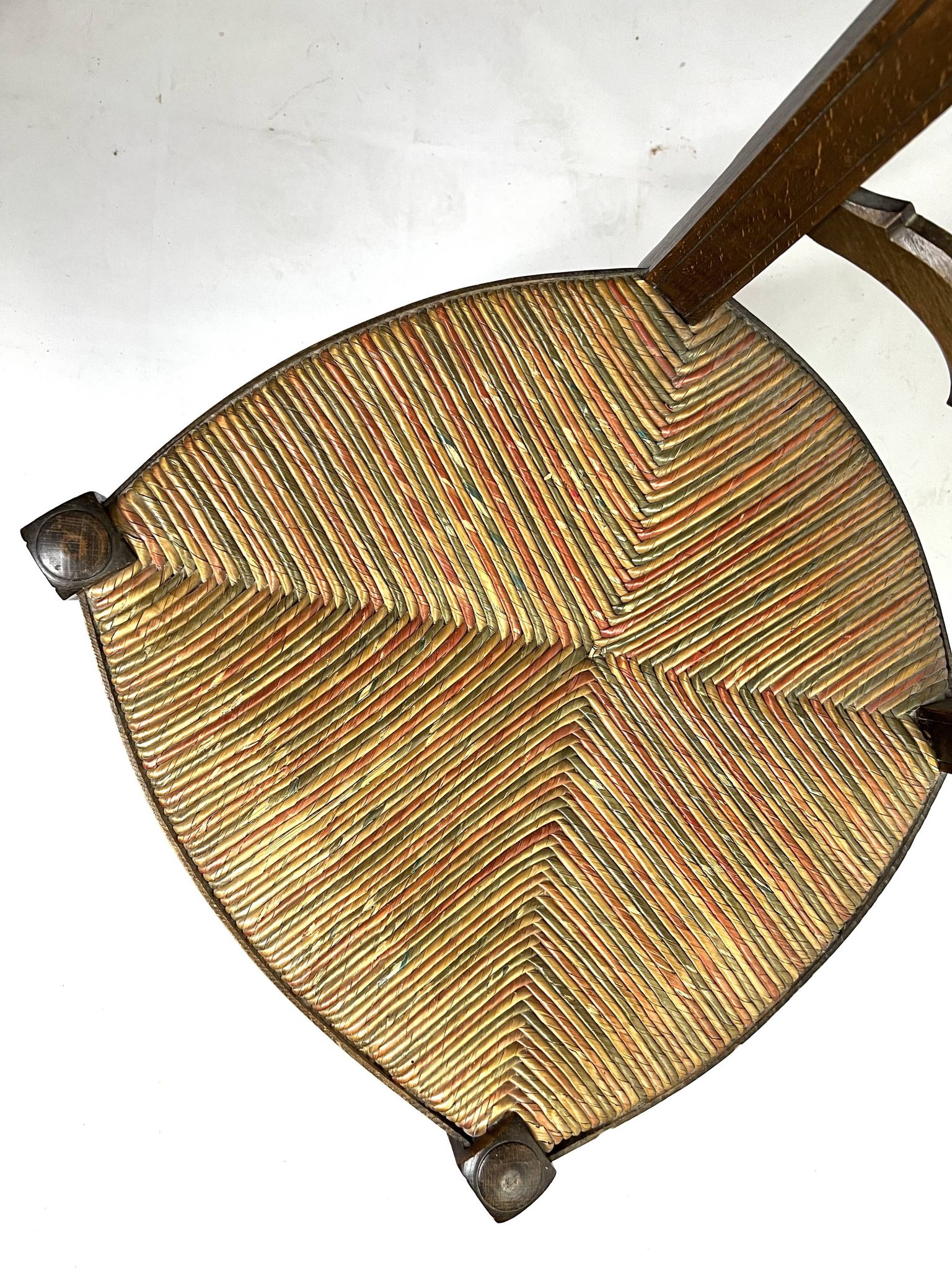 Antique wooden and straw nurse's chair - openwork backrest with bars c