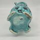 Art Deco turquoise vase with a deer design