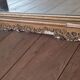 Antique Louis Philippe mirror with a pediment.