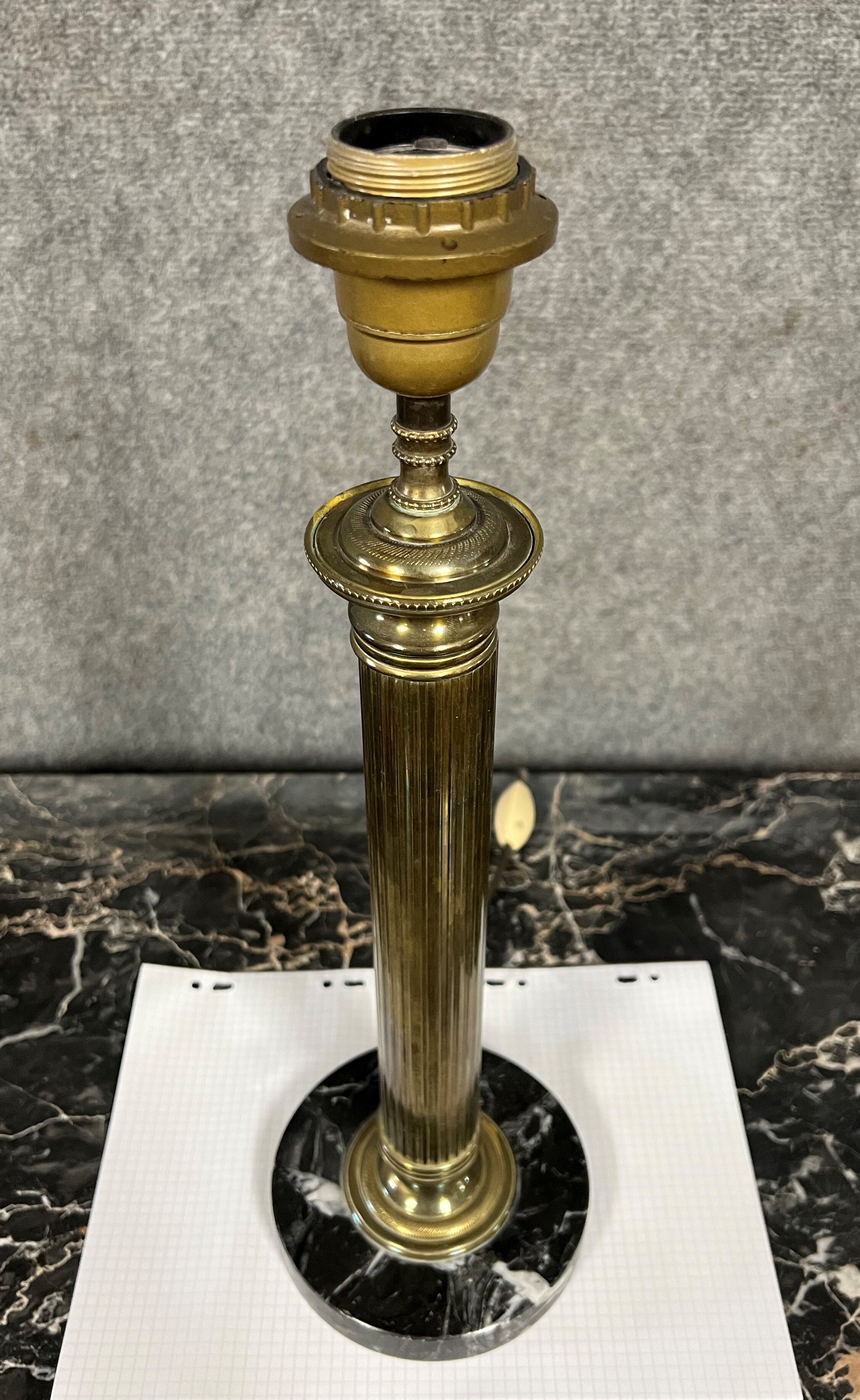 Lamp foot in gilded brass and black marble Louis XVI era around 1900