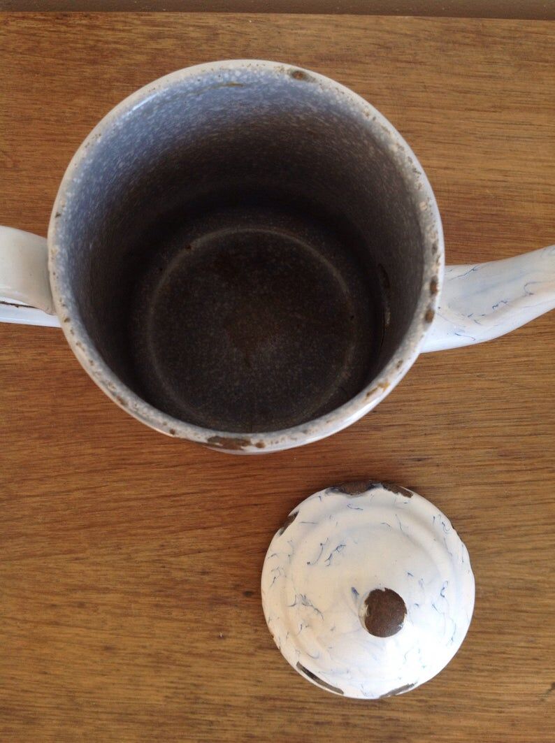 Enamelled tin teapot