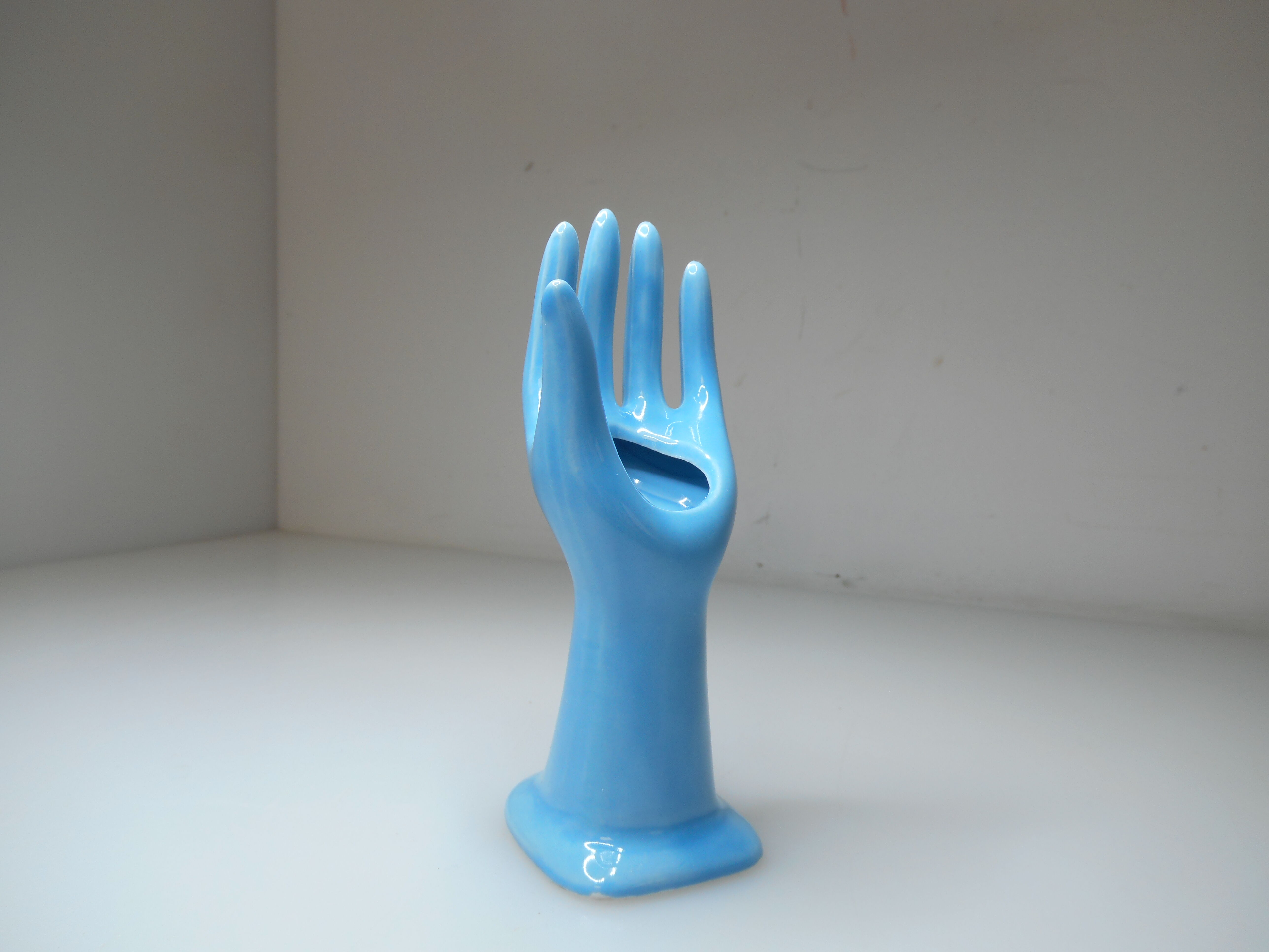 Vintage light blue ceramic hand