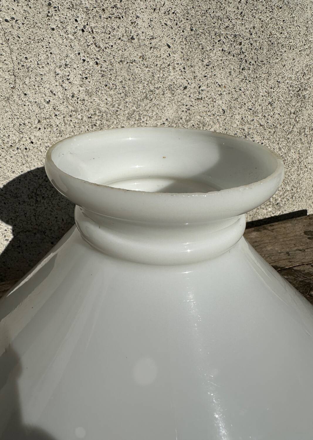 Old white abat-jour in opaline