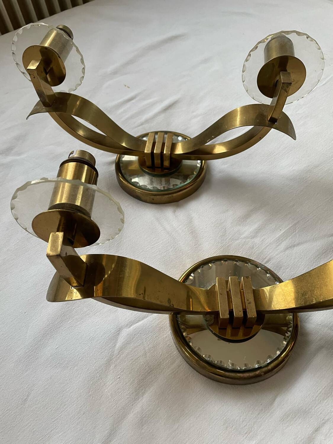 Vintage pair of art deco brass and mirrored glass wall lights France 1940