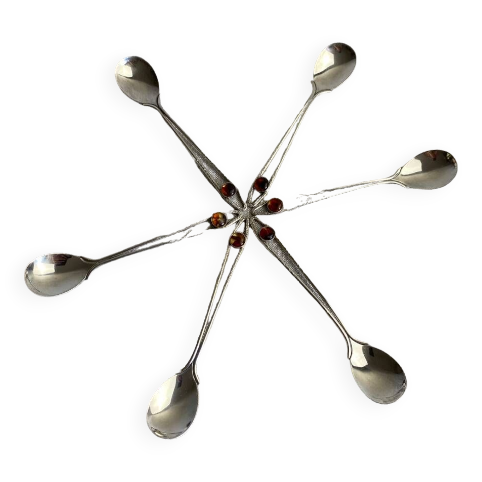 Art Nouveau metal and amber spoons