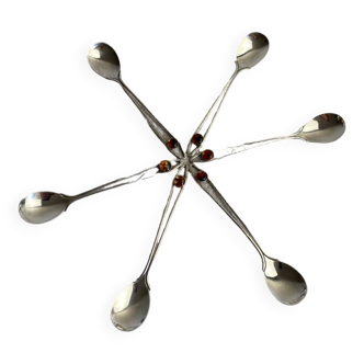 Art Nouveau metal and amber spoons