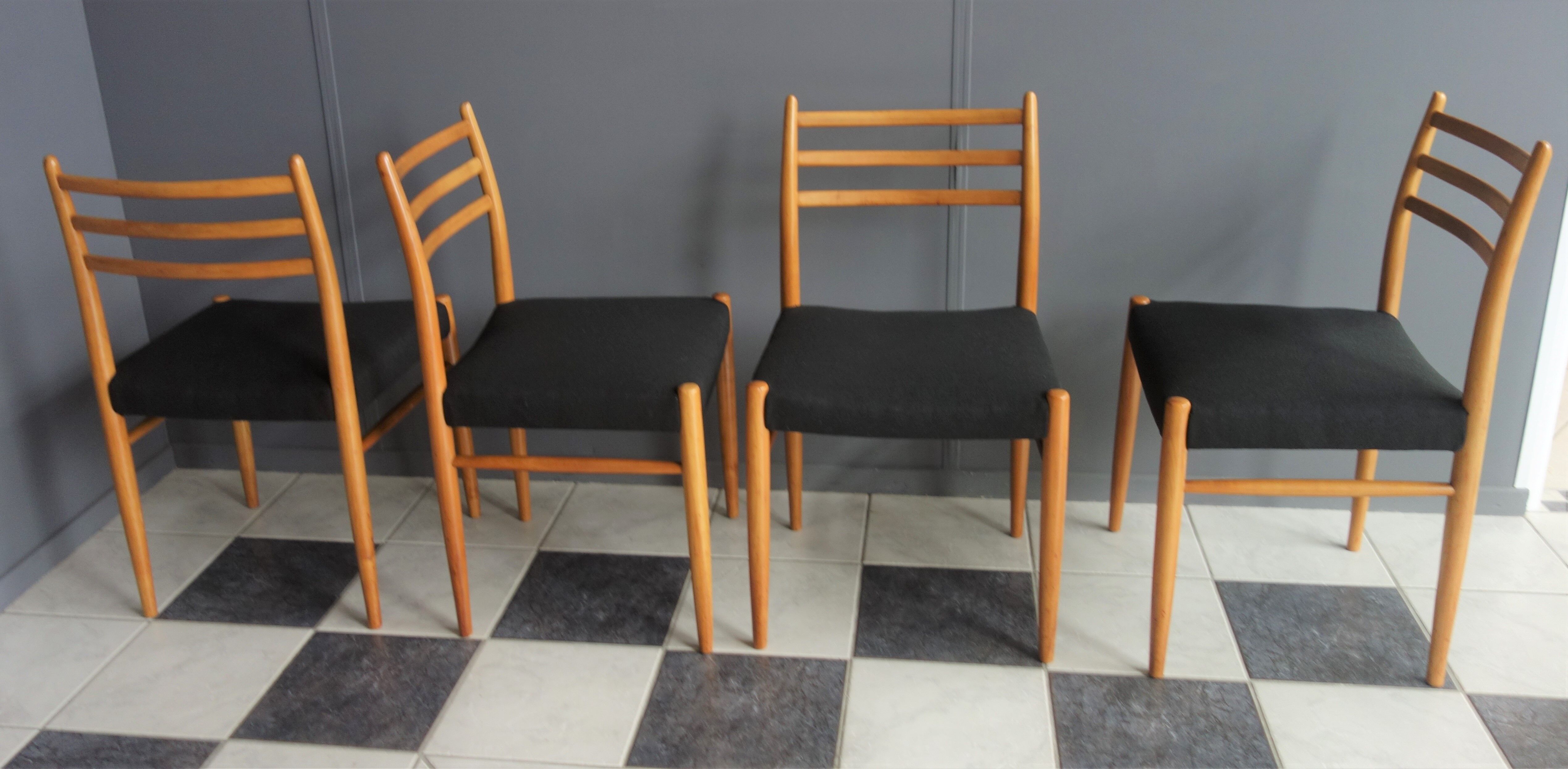 Set of 4 dining chairs in wood and black fabric 1960s