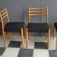 Set of 4 dining chairs in wood and black fabric 1960s