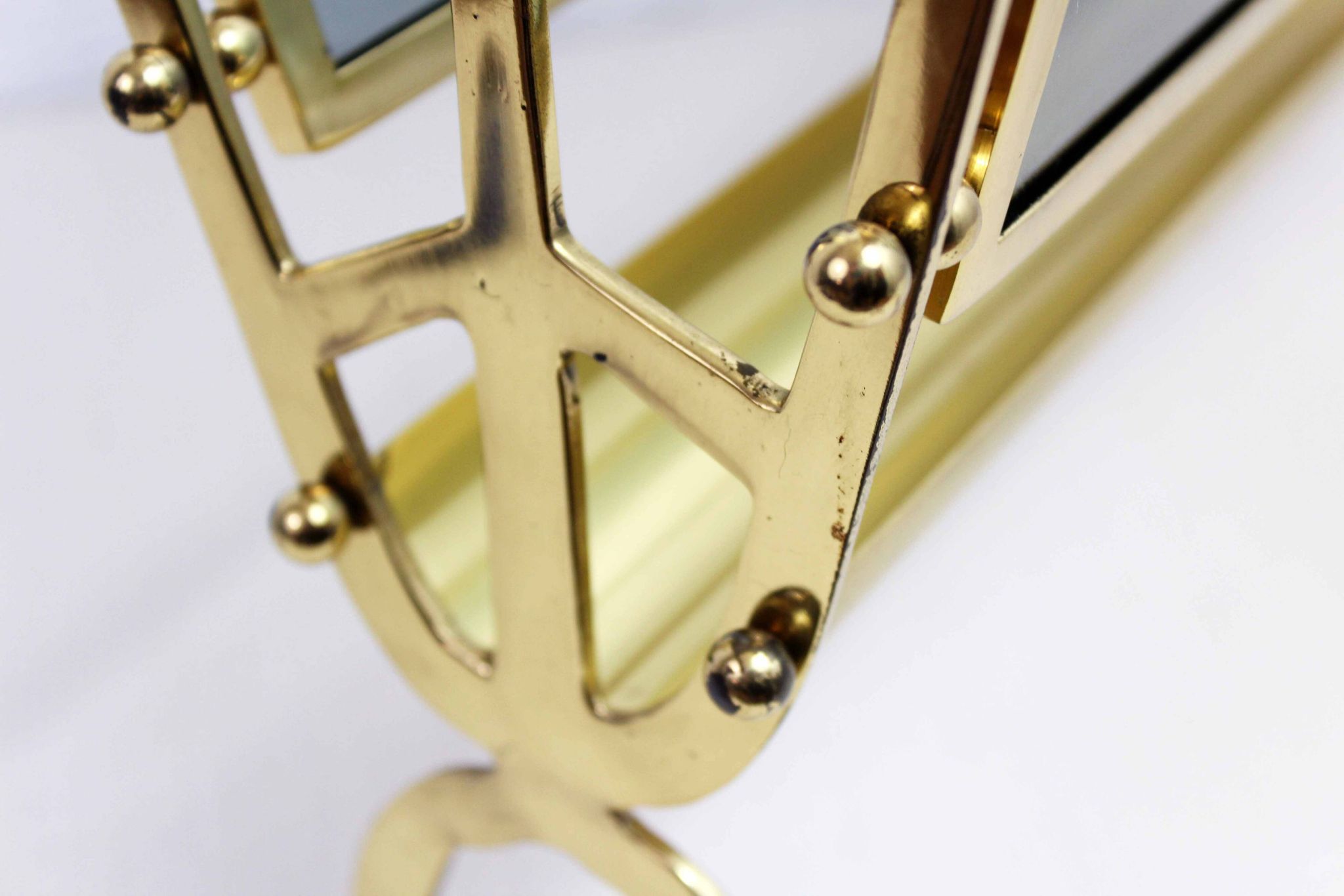 Glass and brass magazine rack, 1970s