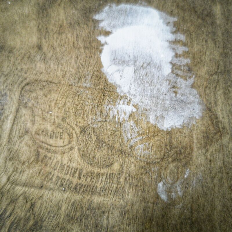 Pair of white Baumann bistro chairs