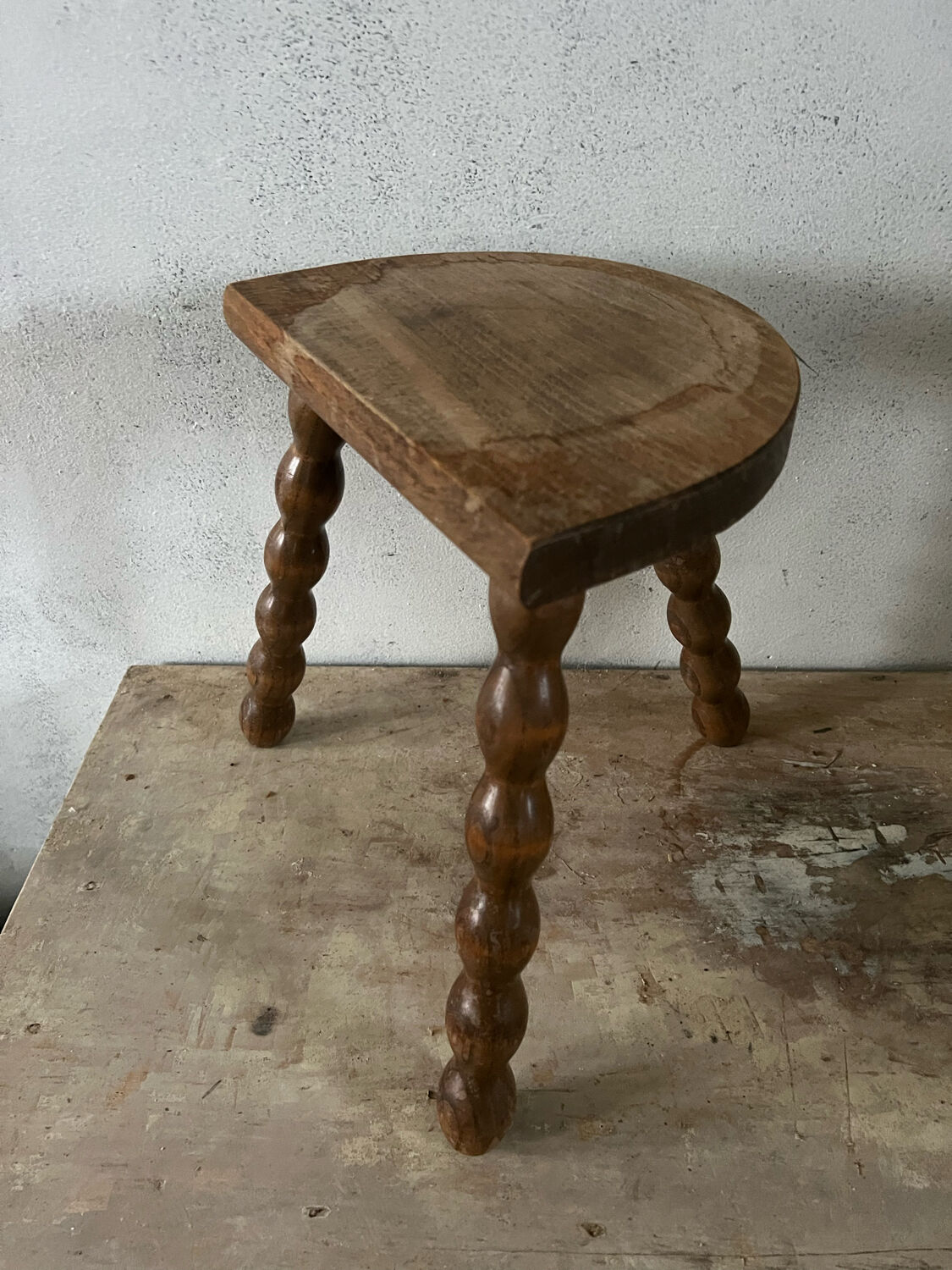 Wooden tripod stool