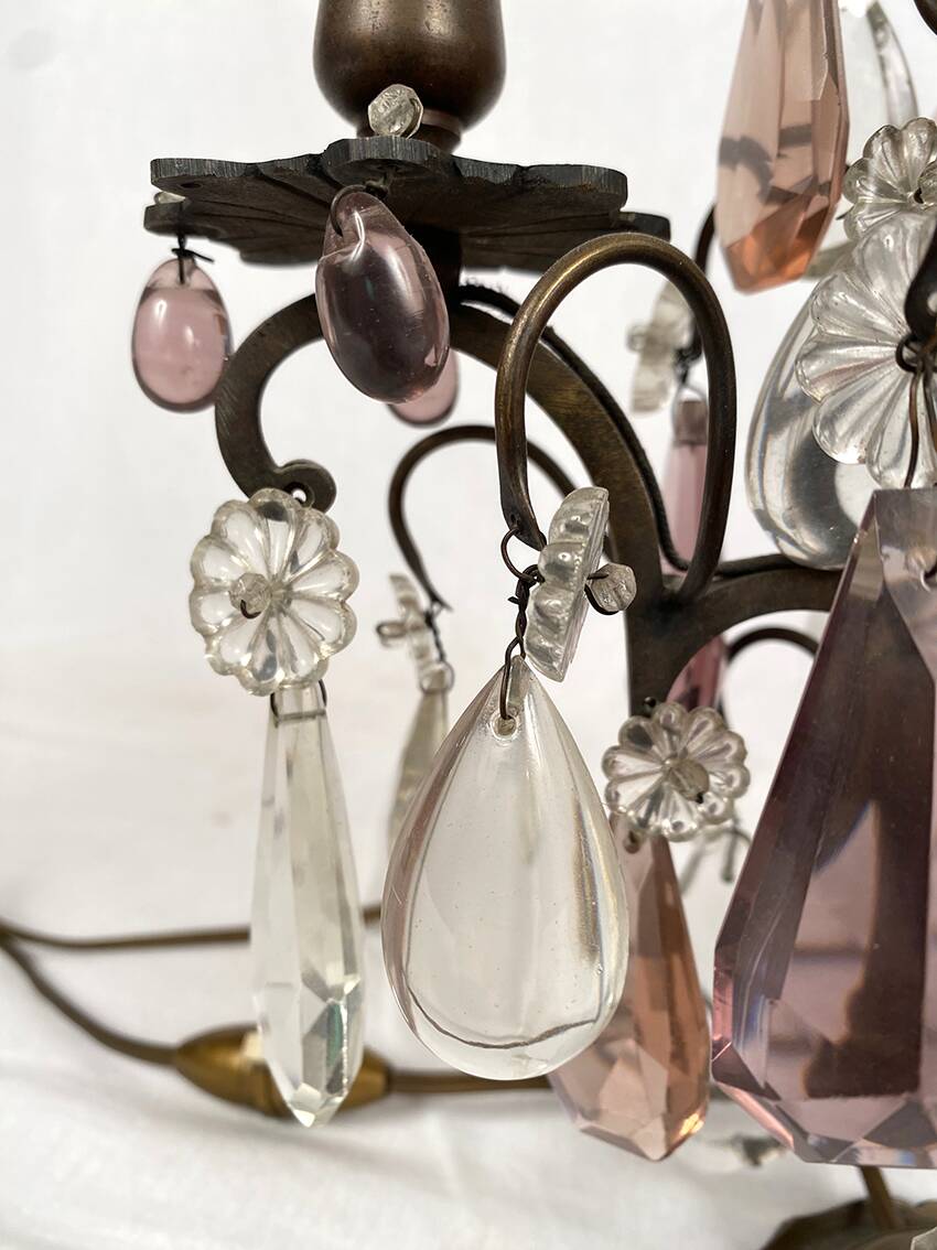 Pair of bronze chandeliers with tassels