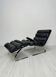 Fauteuil lounge en cuir noir COR Sinus avec repose-pieds