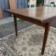 Rectangular extendable table in Scandinavian style made of teak.