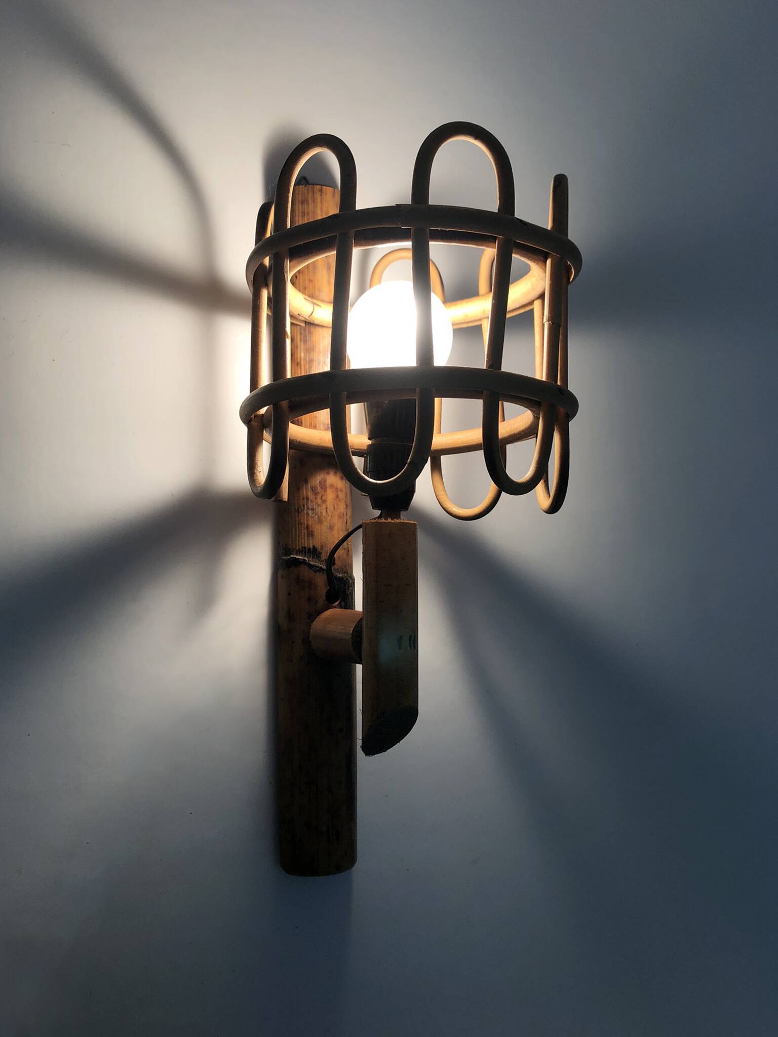 Pair of rattan bamboo lantern wall lights. 1950s-1960s