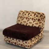 Vintage armchair from the 70s in beige and brown.