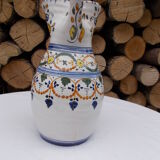 Decorated earthenware pitcher