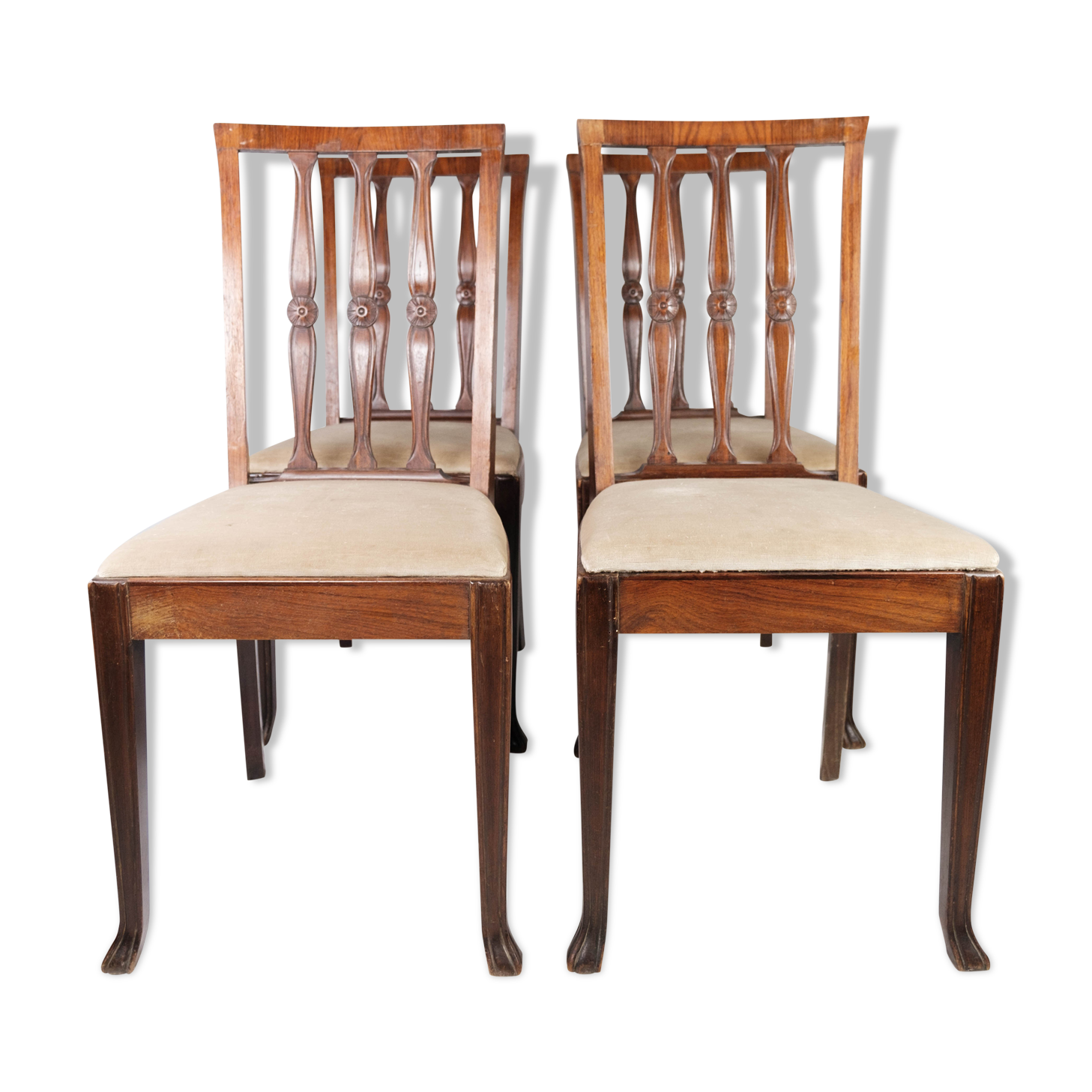 Set of four dining room chairs in rosewood and upholstered with light fabric, 1920s