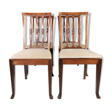 Ensemble de quatre chaises de salle à manger en palissandre et rembourré avec du tissu léger, années 1920