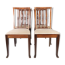 Set of four dining room chairs in rosewood and upholstered with light fabric, 1920s