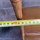 vintage rattan shelf on stand