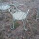 Garden furniture in green wrought iron