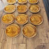 Vintage barbotine plates with fish decoration, 22 pieces.