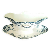 Antique sauce boat on a base in ironstone pottery.