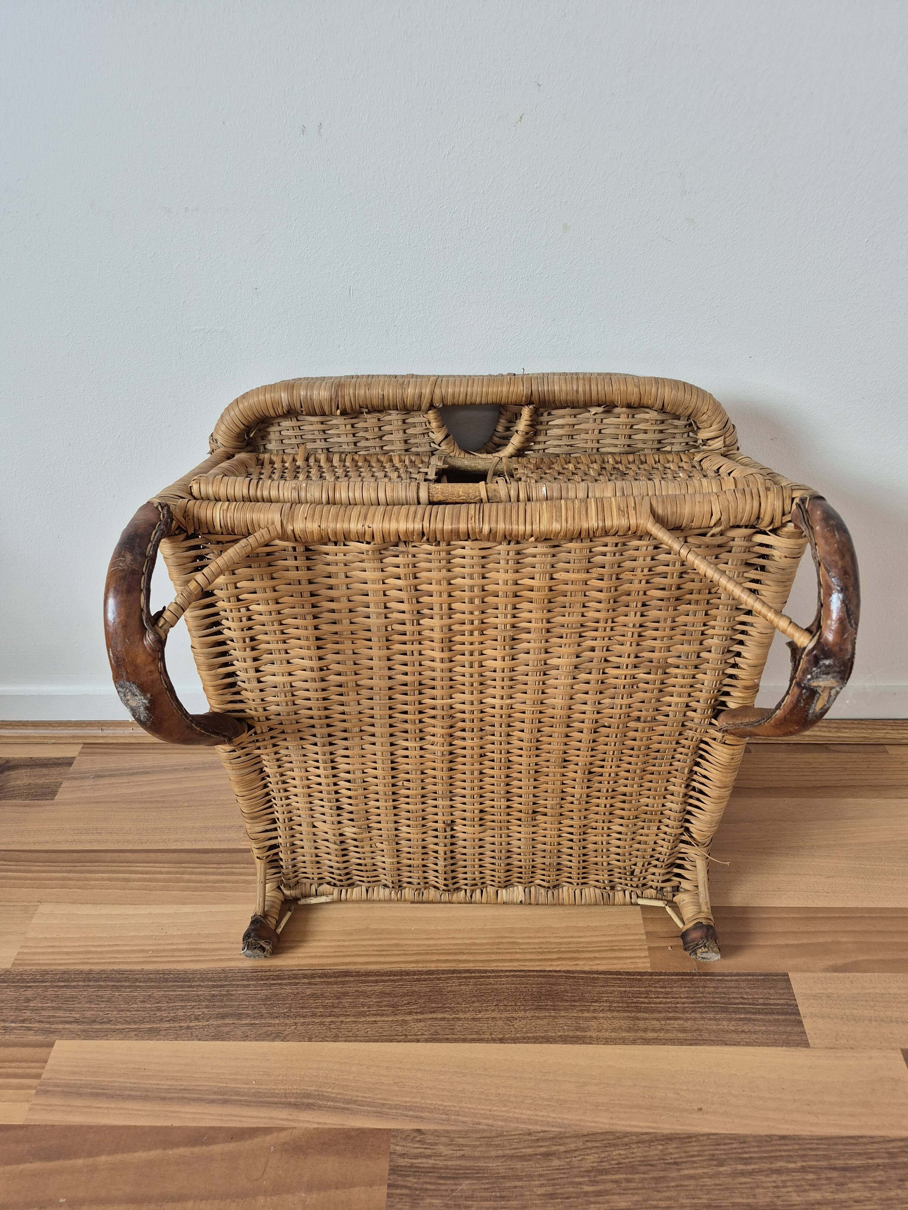 Vintage foldable beach chair, picnic in rattan and leather.