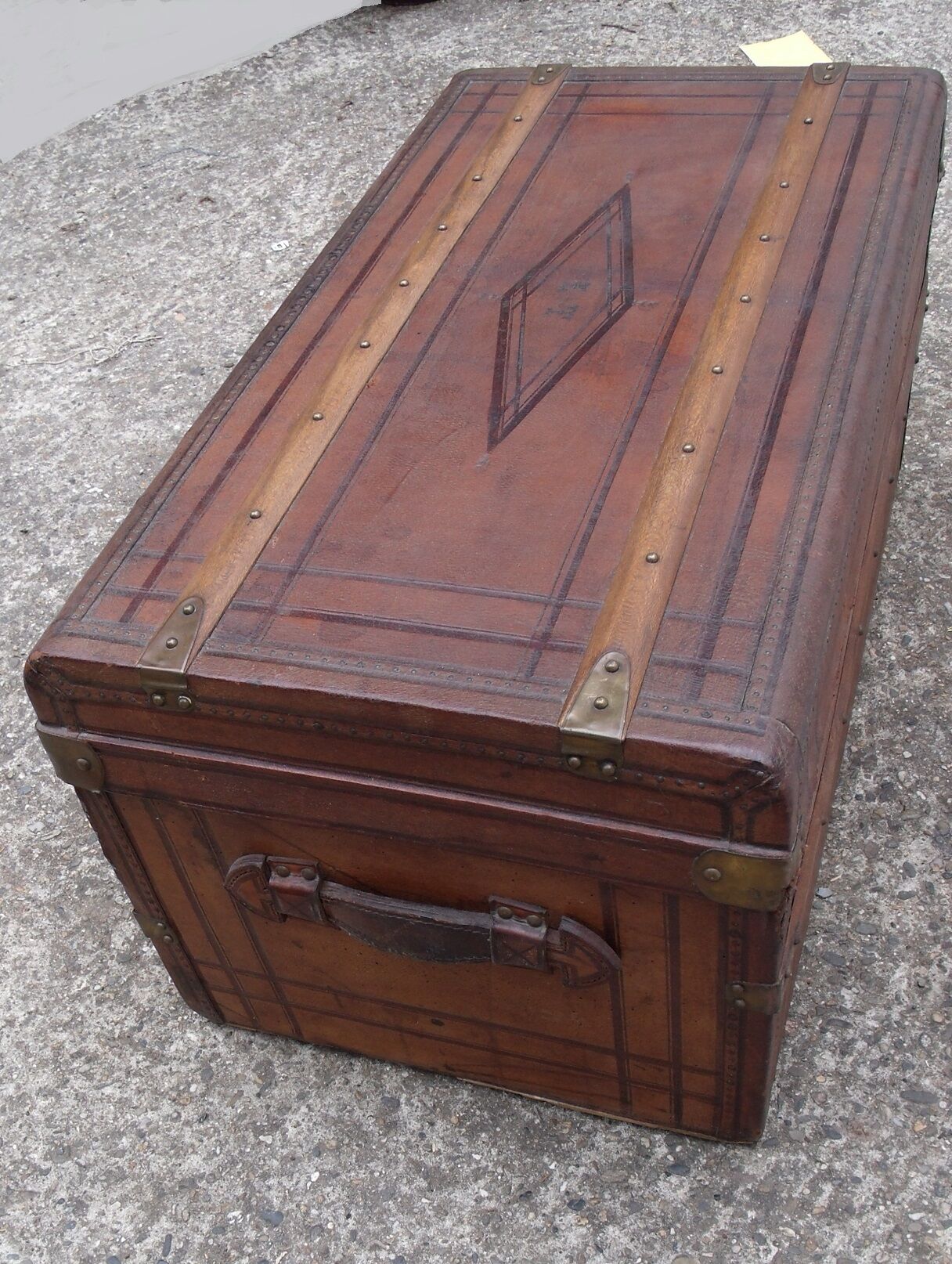 Old wooden trunk covered leather travel chest
