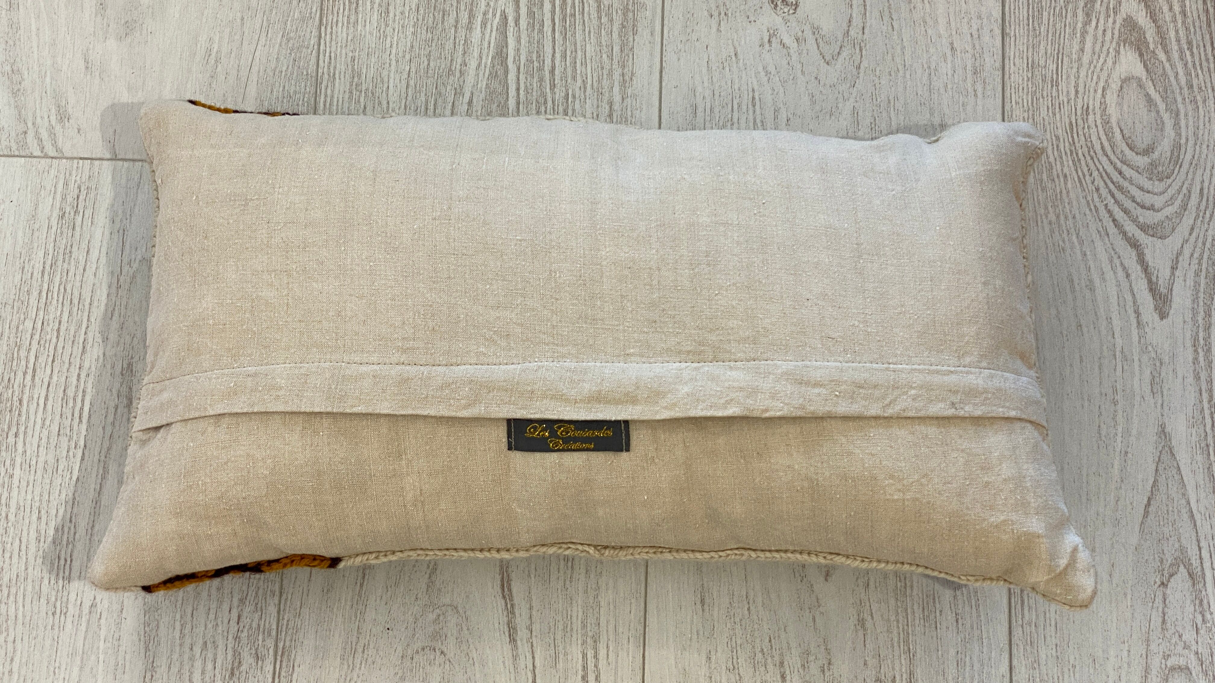 Pair of vintage retro wool knitted cushions