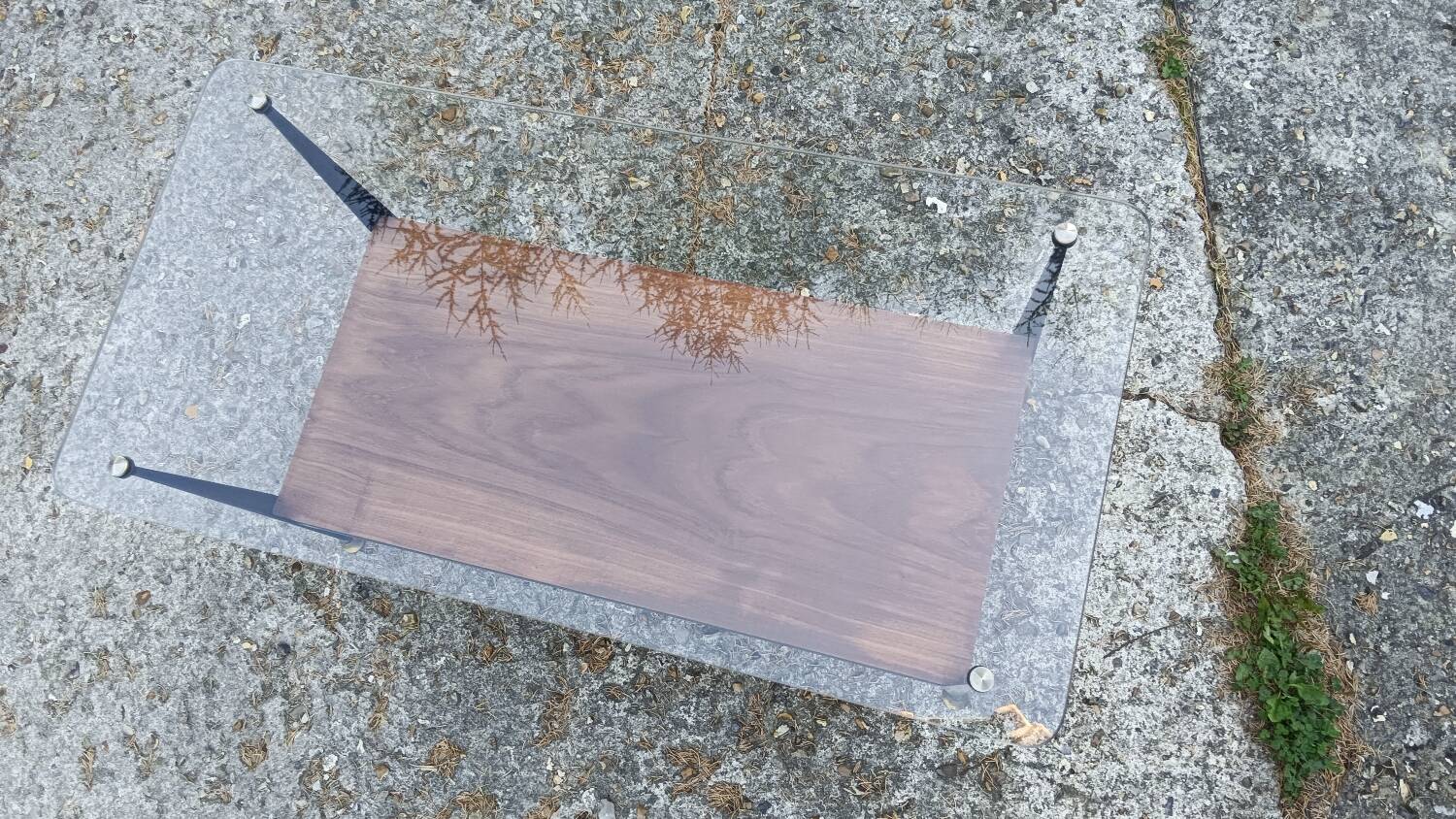 Coffee table in glass, wood and steel, mid-20th century.
