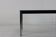 Table basse avec un plateau en pierre noire Martin Visser design