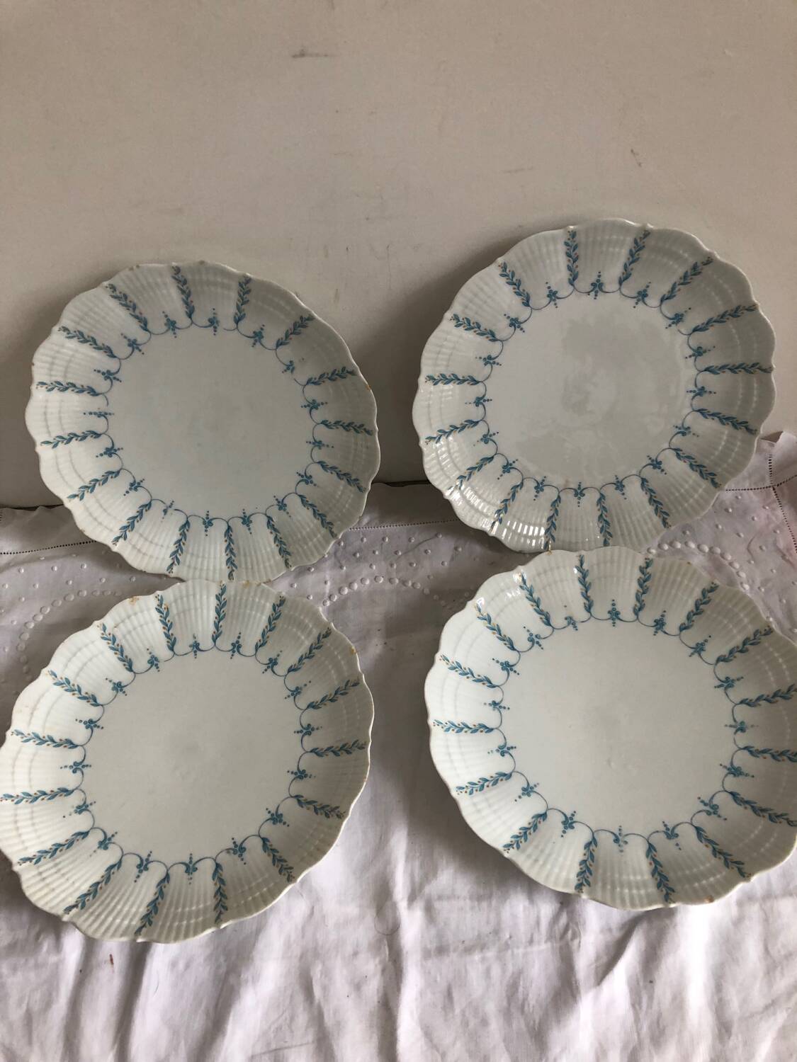 Set of 4 antique Giraud Sauviat porcelain plates.