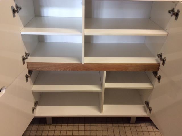 High furniture in white lacquered wood