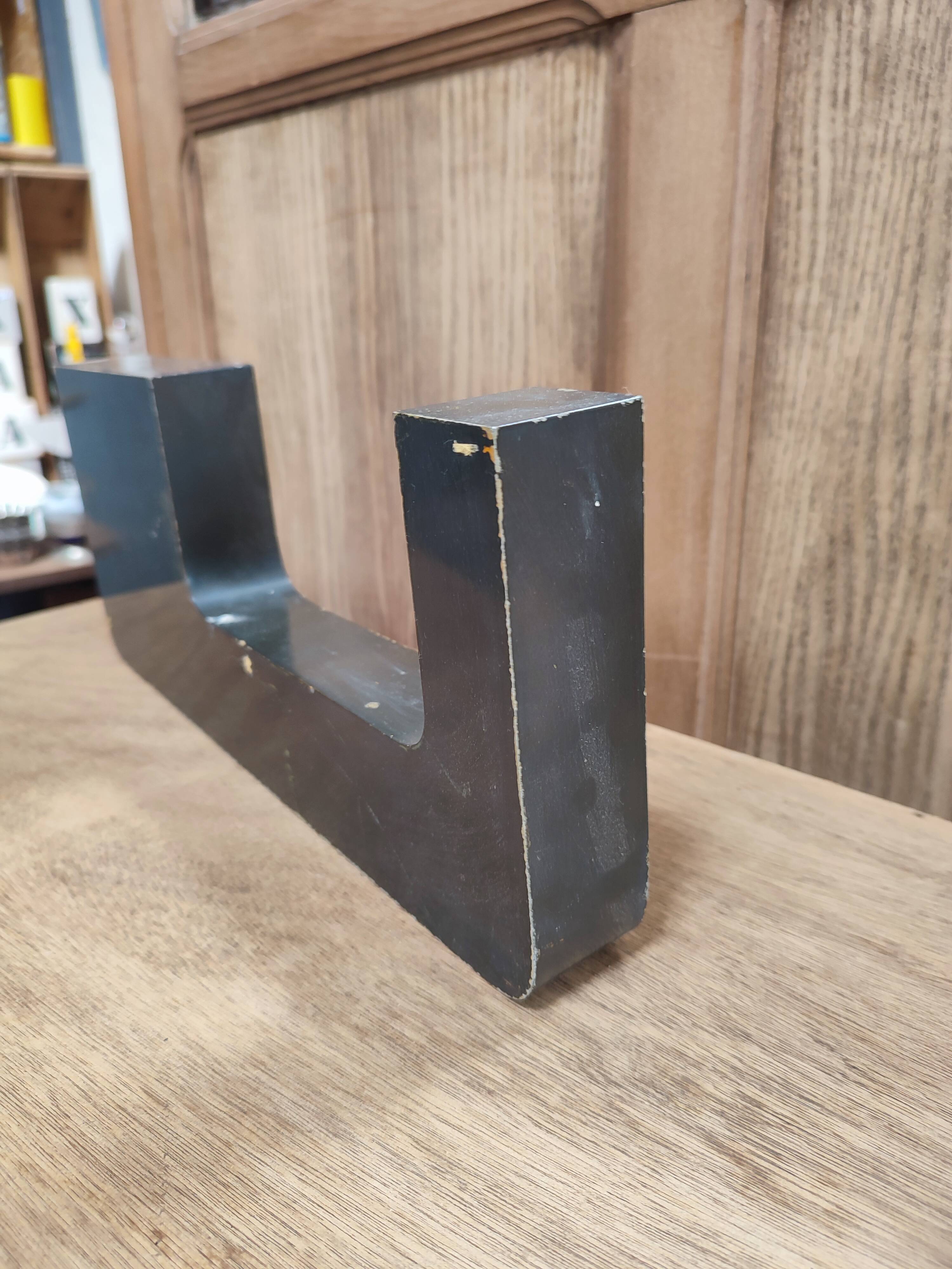 Vintage sign letter U