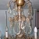 Brass chandelier with glass shaft, crystal tassel plates and daggers - 6 lights