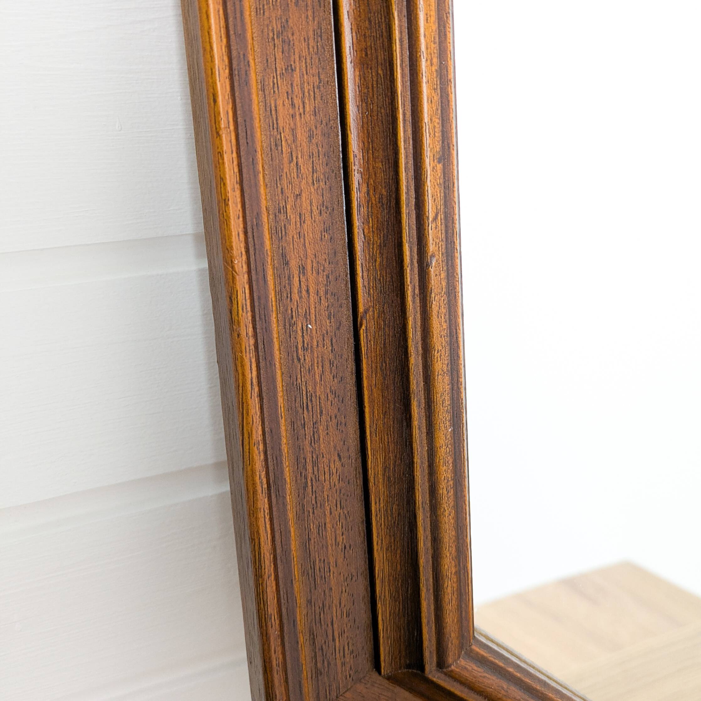 Miroir vintage octogonal en bois massif avec détails sculptés