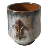 Fleur-de-lis glazed earthenware mug