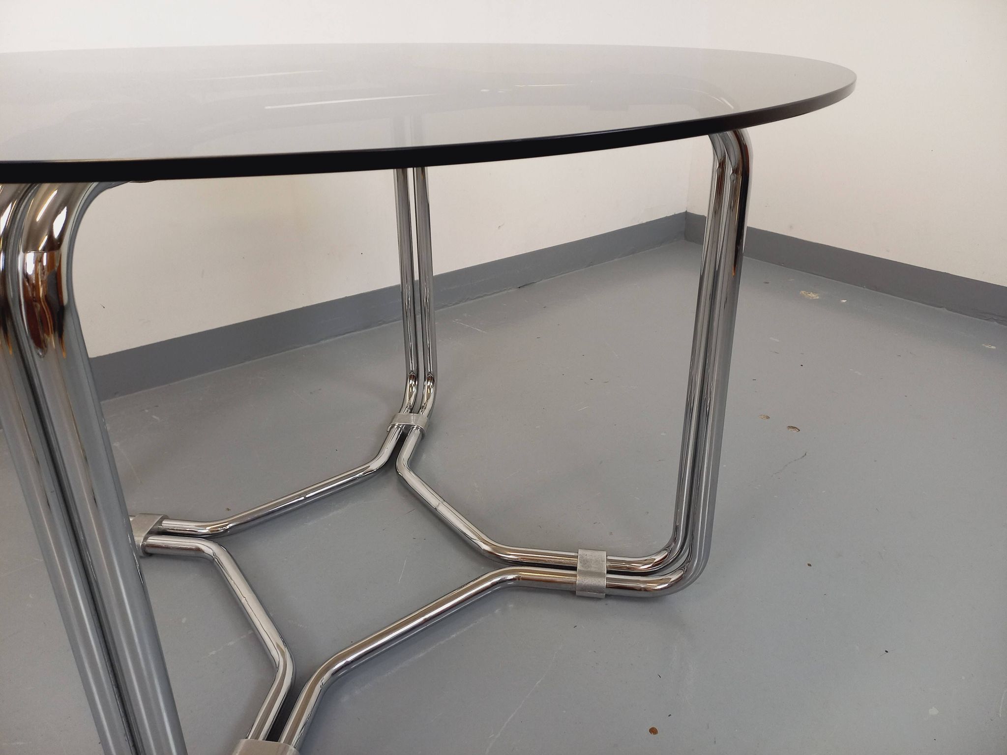 Vintage round dining table in smoked glass and chrome metal