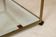 Table basse en laiton, verre et miroir 1970