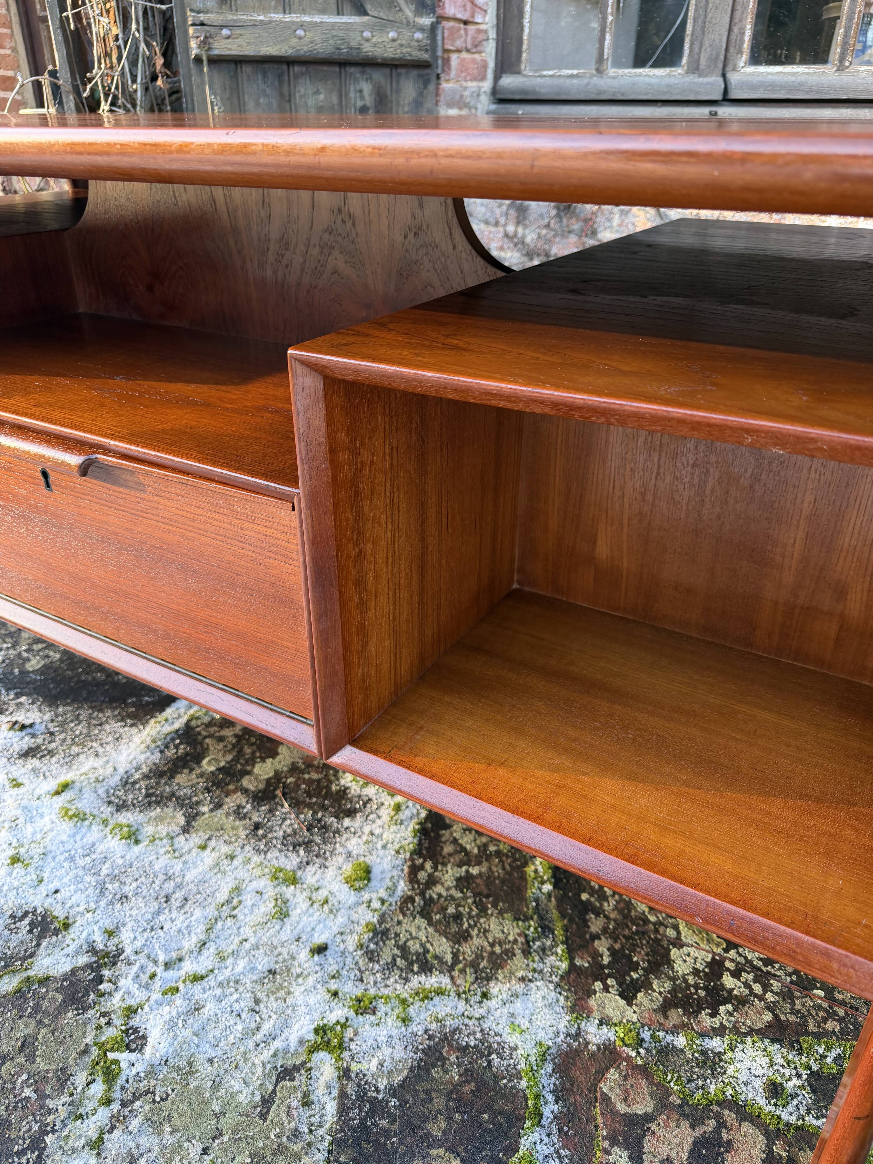 Danish teak desk Gunni Omann no. 75 from the 1960s.