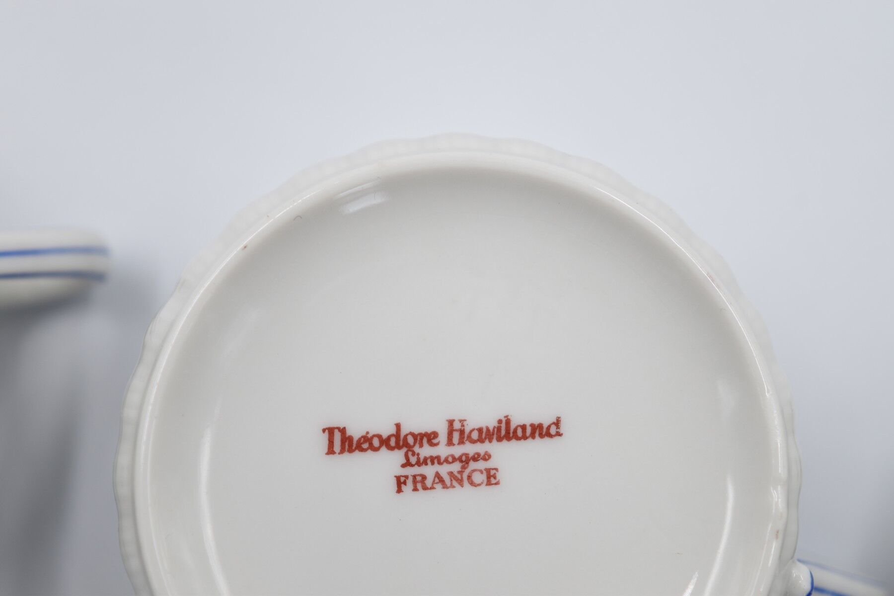 Three cups and under porcelain tea cups from Limoges Haviland barbed-wire décor