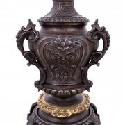 Pair of bronze oil lamps, France, circa 1880.