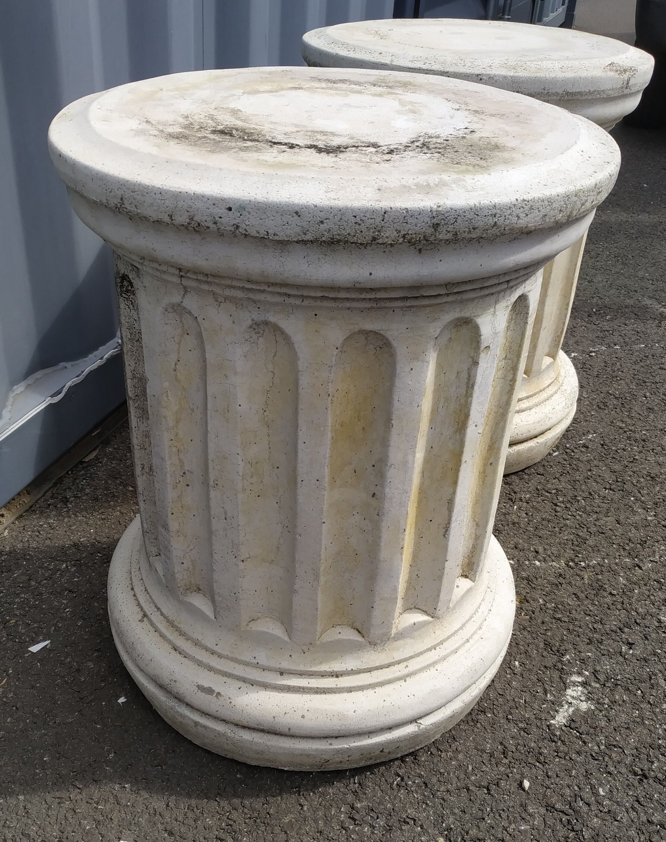 Pair of low Columns of Greco-Roman style concrete garden