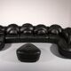 Organically shaped post-modern sectional sofa in black leather