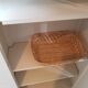 Old white asymmetrical chest of drawers